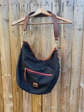 Dooney & Bourke Black Shoulder Hobo with Brown Leather Trim and Red Zipper